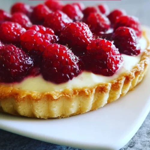 Tarte au mascarpone garnie de framboises fraîches